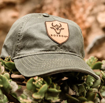 OLIVE OILSKIN CAP LEATHER PATCH BOSBOK